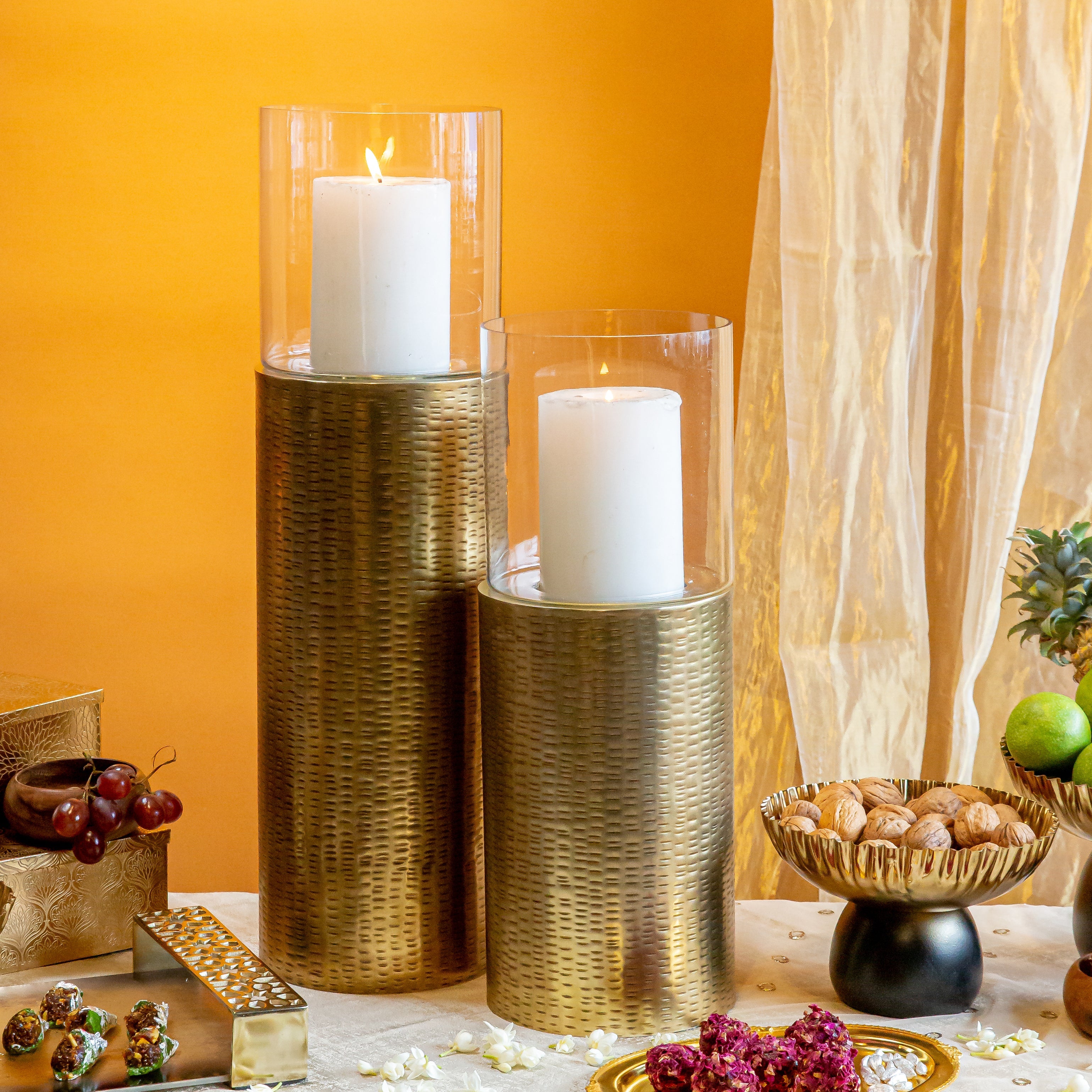 Gold pillar store candle holders